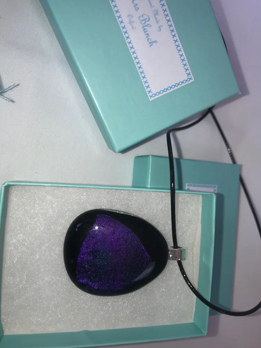Purple dichroic decoration on a black background P007