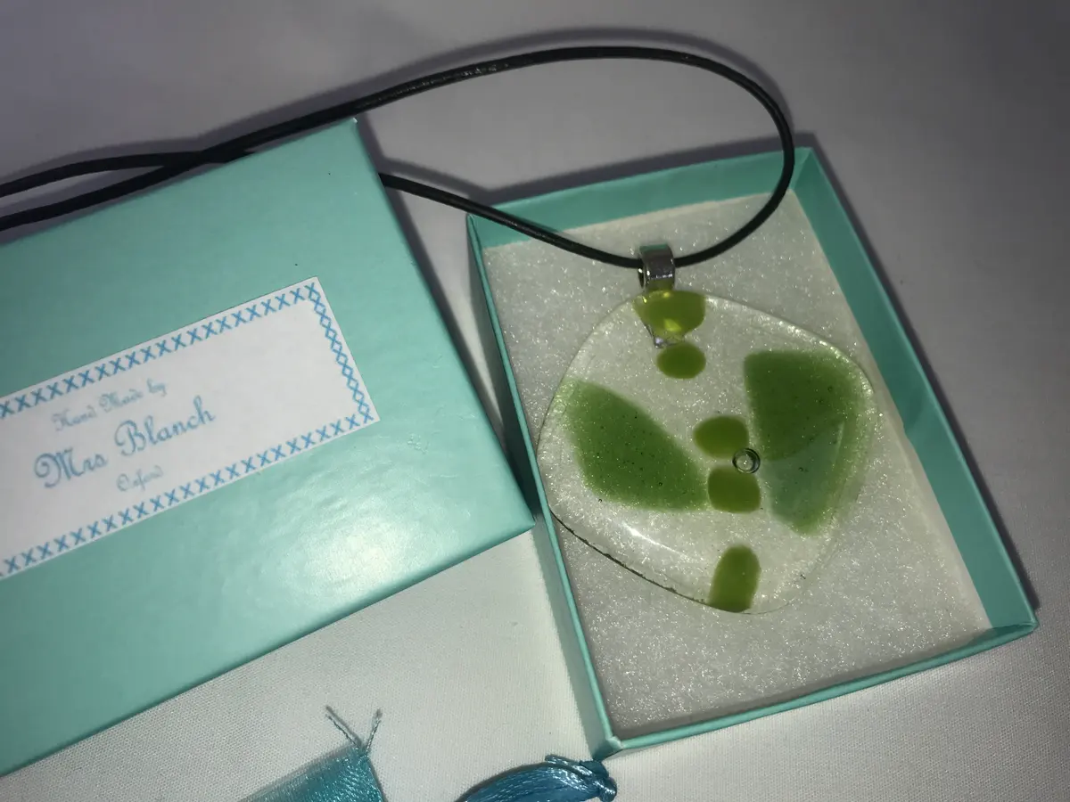 Two tone green decoration on clear P0017