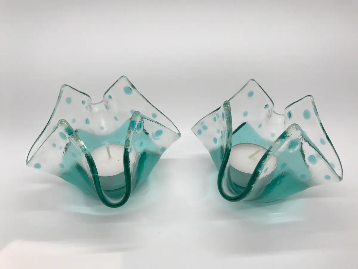 Light aqua candle holder. £22.00 each