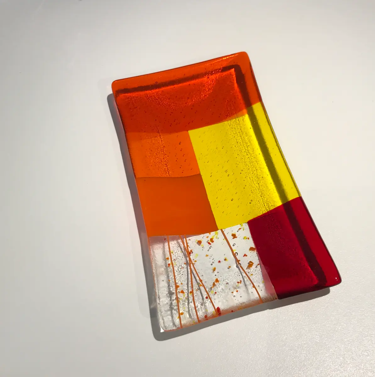 Orange, red and yellow oblong dish approx 23.5cm x 13 cm x 2cm £50.00