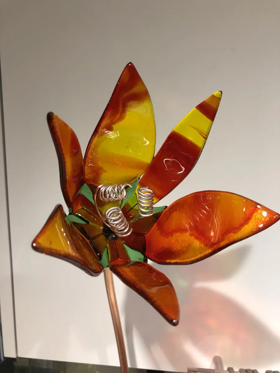 Red/yellow steak lily on copper stem. Outdoor garden art. Flower head approx 12cm x 14cm. Stem approx 70cm. £50.00.
