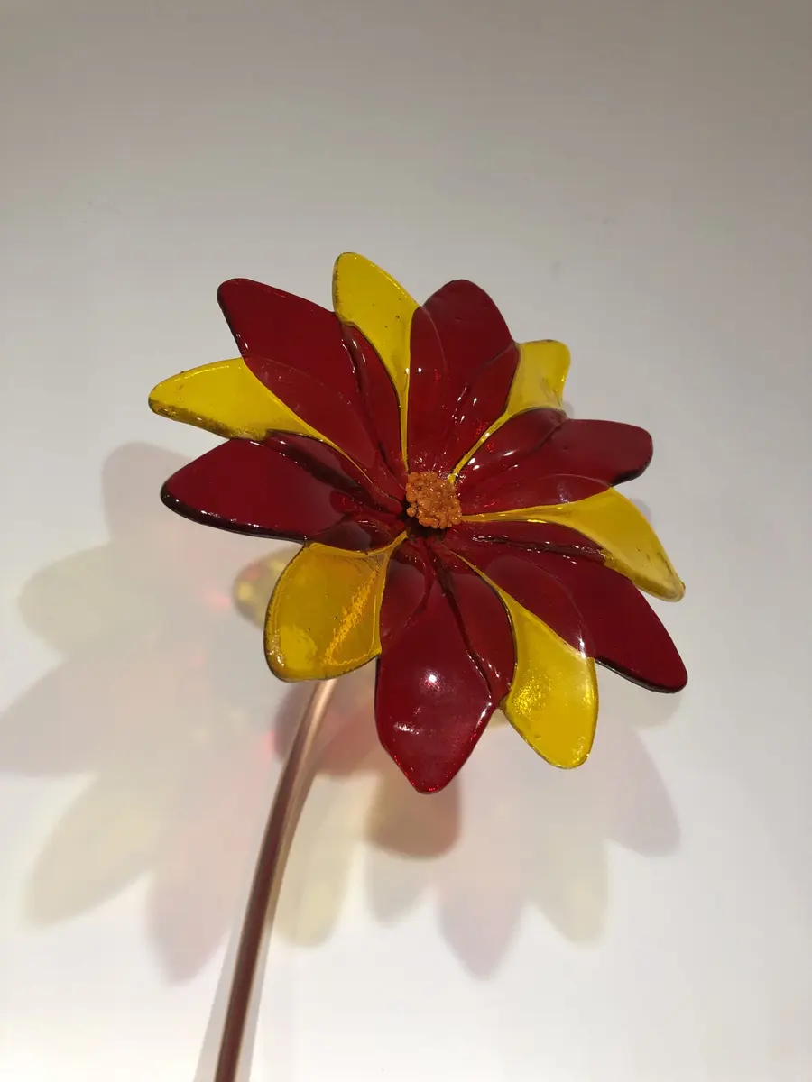 Red/yellow flower on copper stem. Outdoor garden art. Flower head approx 15cm across. Stem approx 70cm. £50.00.