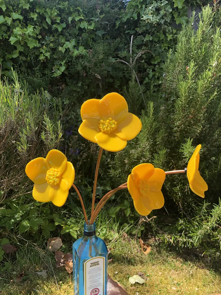 Butter cups. Approx 10cm diamter on copper stems of 50-60cm. Garden Art. £45.00 each.