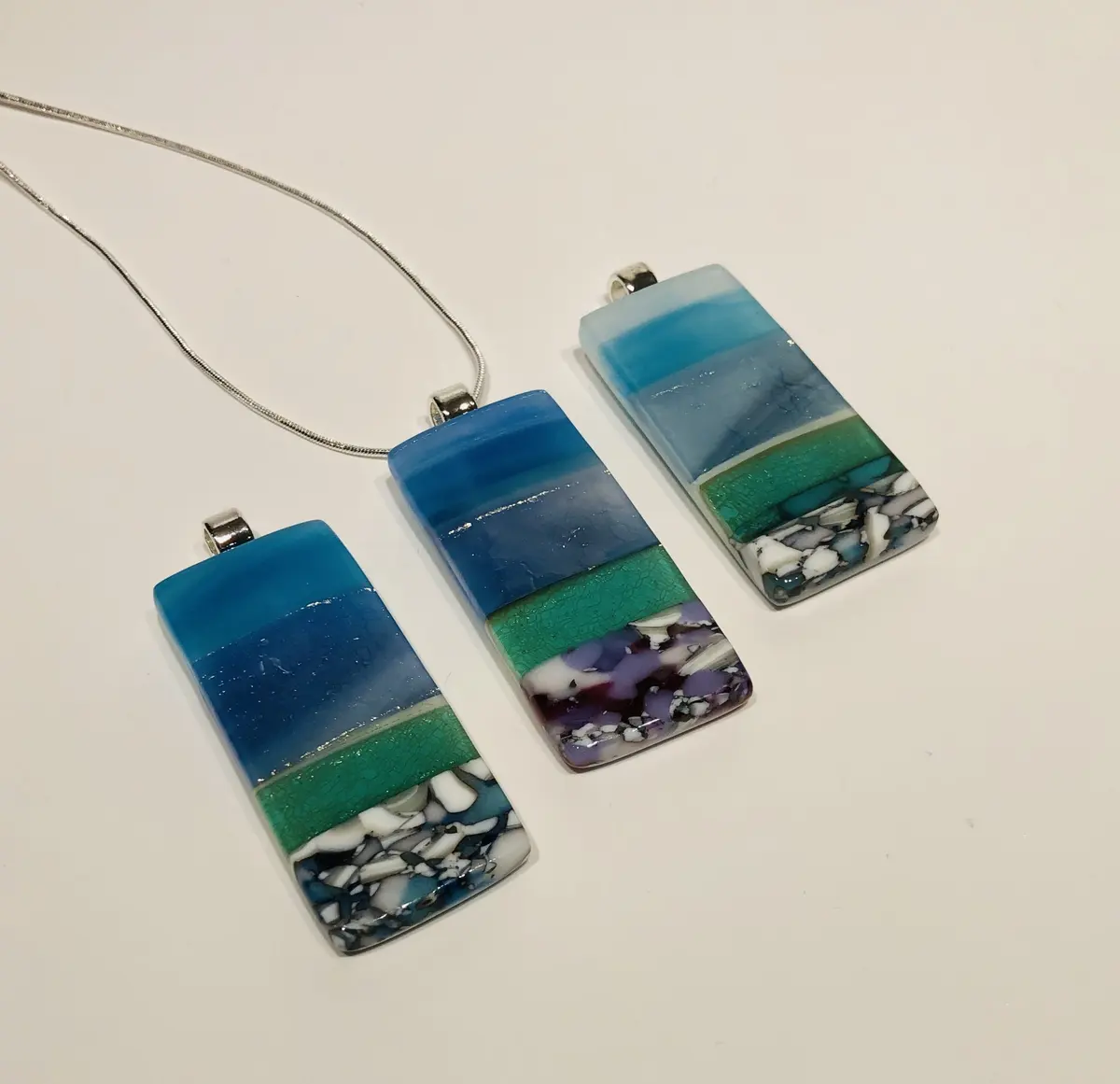 Seascape Pendant approx 2.5cm x 5cm. Supplied with a chain and come boxed. £45.00 each.