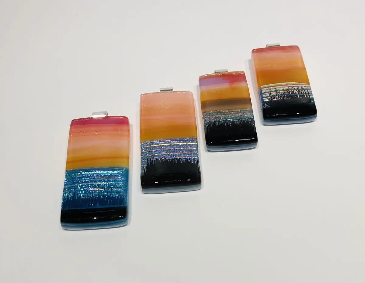 Sunset Pendants approx 2.5cm x 5cm. Supplied with a chain and come boxed. £45.00 each.