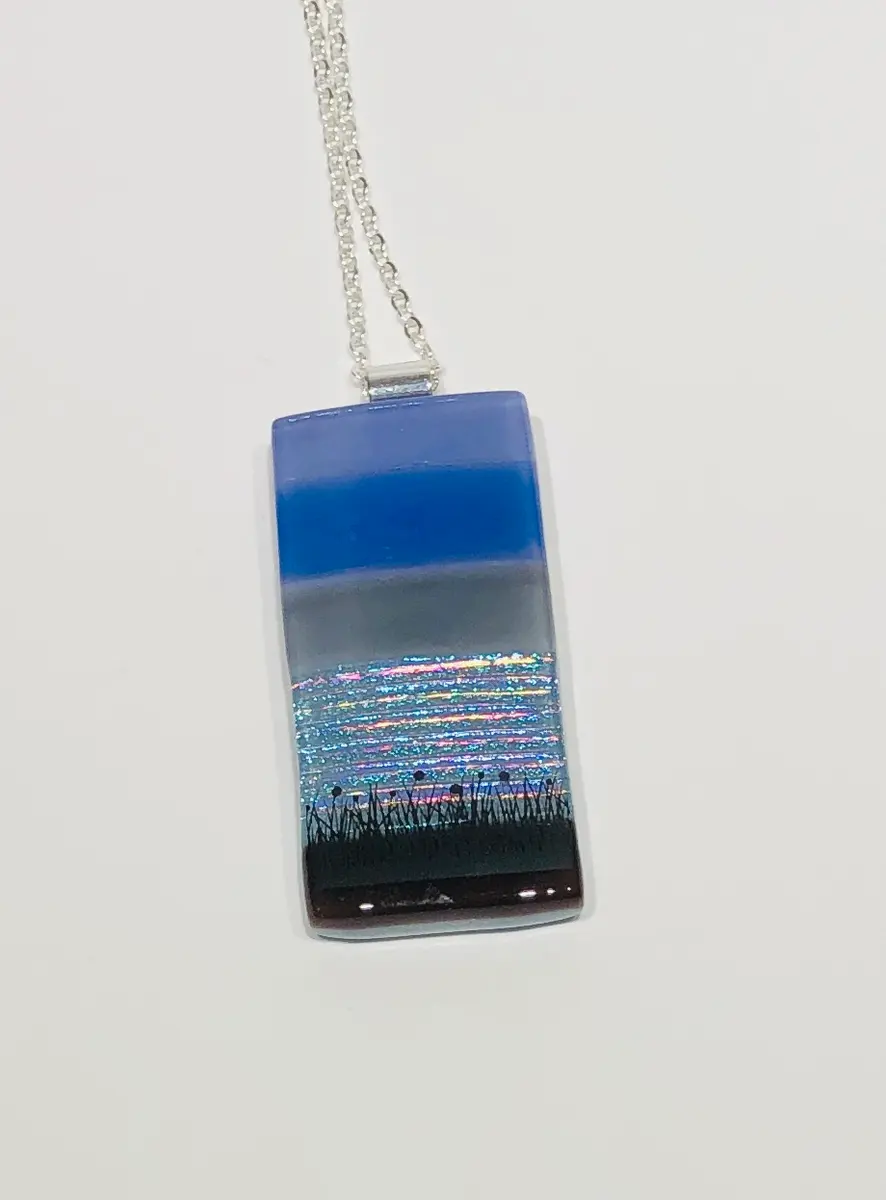 Sunset Pendant approx 2.5cm x 5cm. Supplied with a chain and come boxed. £45.00.