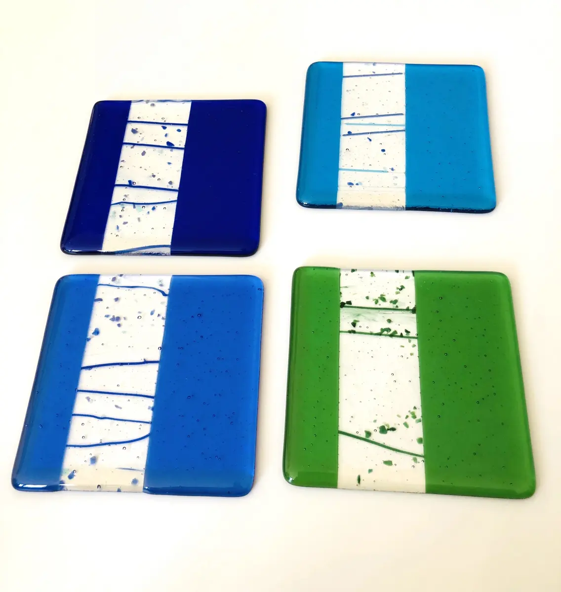 Coasters 10cm x 10cm. Deep royal blue, turquoise, sky blue and light green. £15 each.