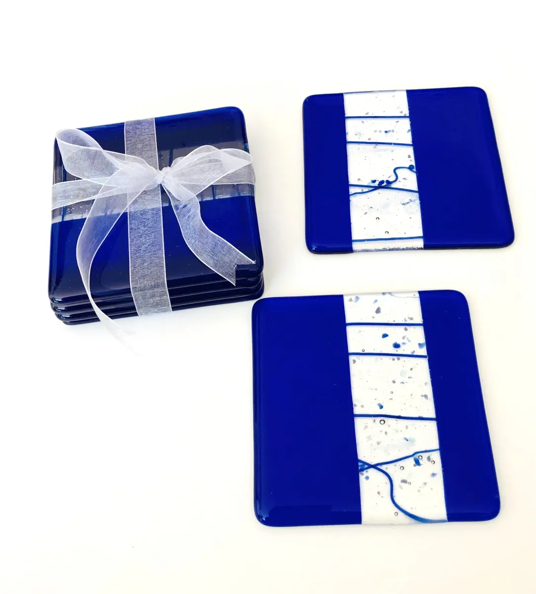 Deep royal blue coasters 10cm x 10cm £15 each.