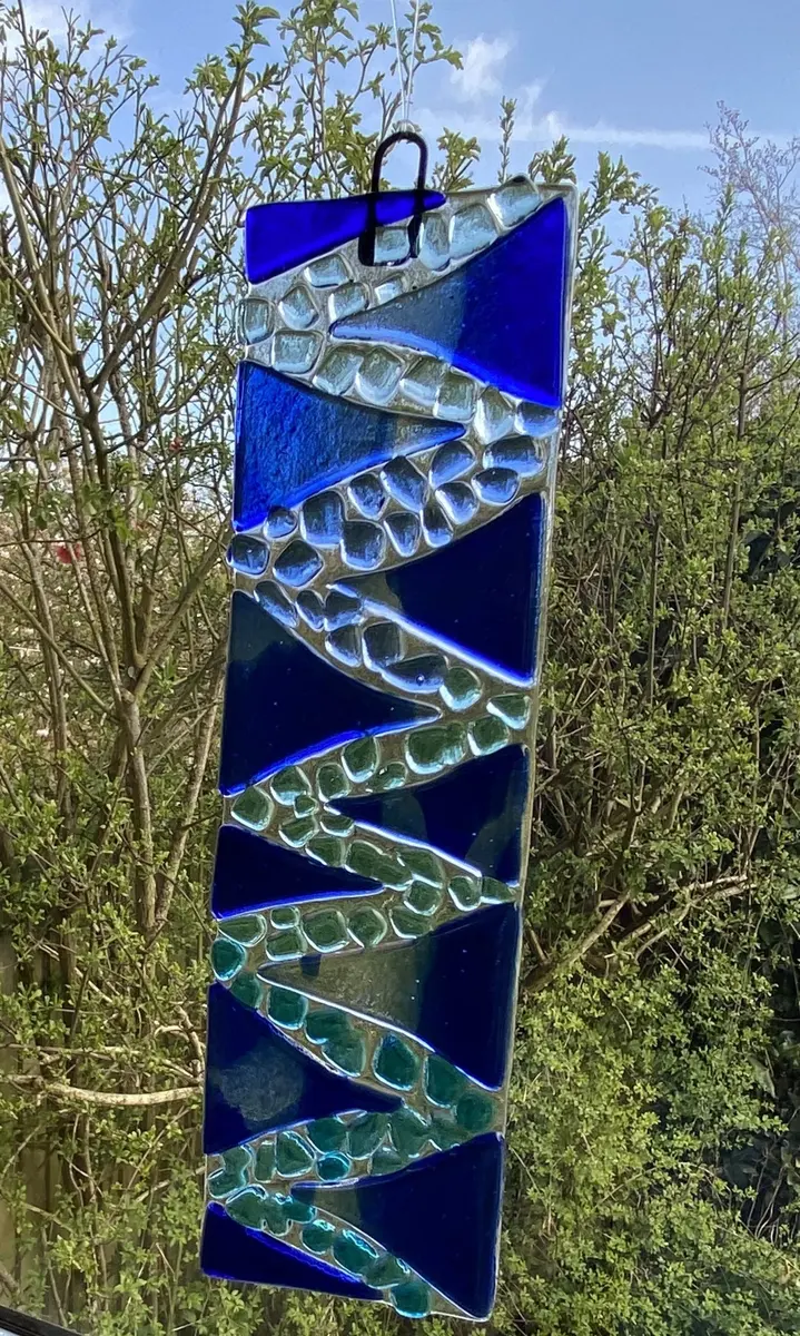 Sun catcher in blue, aqua and turquoise. Approx 20cm x 5.5cm £20.00.